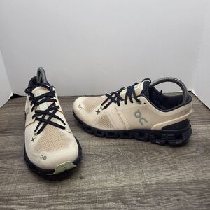 On Running Athletic Shoes in Beige and Black